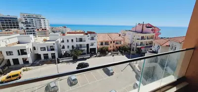 a view from a balcony of a city with buildings at SeaView Apartment & Pool in Ulcinj