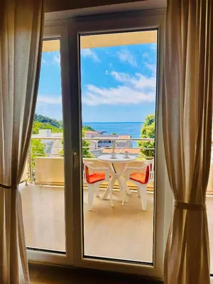 a view of the ocean from the balcony of a house at Beach Bliss in Utjeha