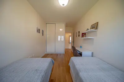 a room with two beds and a hallway at Un posto al sole in Bar