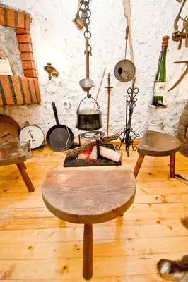 a room with a table and other items on a wall at Sailor's Rustic House in Virpazar