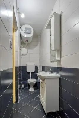 a bathroom with a sink and a toilet in it at SAVOVIC_LUX in Petrovac na Moru