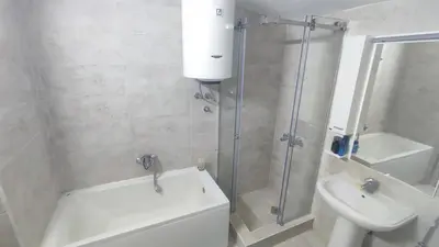 a bathroom with a shower and a toilet and a sink at Liprosh in Virpazar