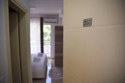 a room with a door with a number on the wall at Apartments kupi ul rudaj 41 in Ulcinj