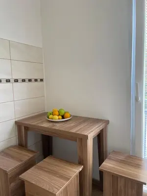 a bowl of fruit on a table in a kitchen at Apartment Center in Sutomore