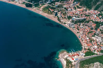 an aerial view of a city and the ocean at Alex Lux sea view apartment 1 in Rafailovici
