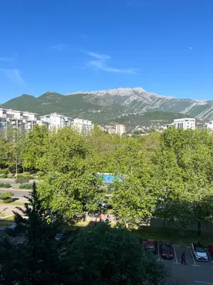a view of a park with trees and buildings at Apartment Hana in Bar