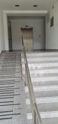 an empty hallway with stairs in a building at Stan u centru BEST VIEW in Bar
