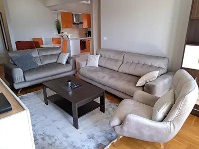 a living room with couches and a coffee table at Stan u centru BEST VIEW in Bar