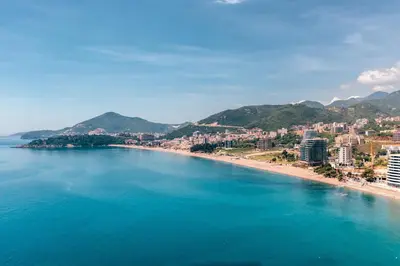 an aerial view of a beach with buildings at Alex Lux sea view aparmtent 2 in Rafailovici