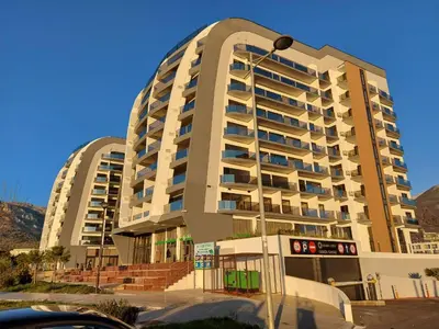 a large apartment building with two buildings at SOHO JC Apartment in Bar