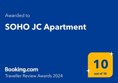 a yellow square with the words solo ic appointment on it at SOHO JC Apartment in Bar