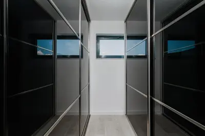a room with glass doors and a window at Villa Garden with Private Outdoor Pool in Kotor