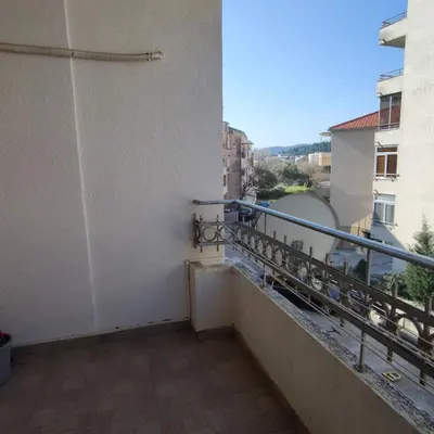 a balcony with a view of a city at Apartman Becici beach in Becici