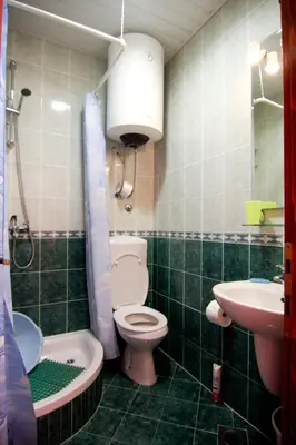 a bathroom with a toilet and a sink at Villa Budvanka Guesthouse in Budva