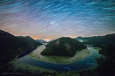 a view of a river at night with stars at Holiday home in Rijeka Crnojevića