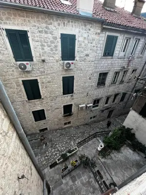 an overhead view of a stone building with windows at Puerta Apartments in Kotor