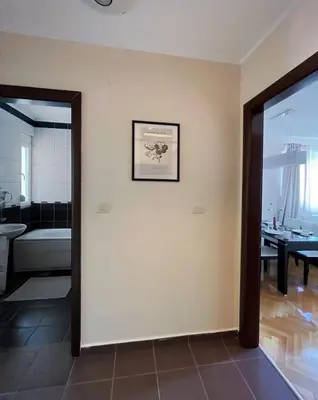 a room with a bathroom with a sink and a tub at Lana apartment Petrovac in Petrovac na Moru