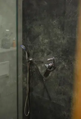 a shower in a glass door with a shower head at Sofija in Ulcinj