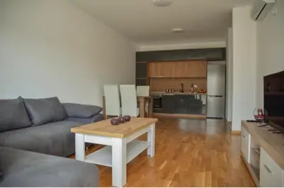 a living room with a couch and a table at Sofija in Ulcinj