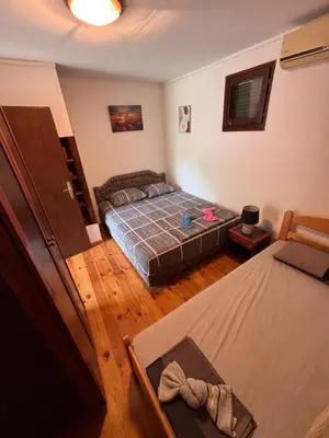 an overhead view of a bedroom with two beds at Vikendica Nina in Čanj