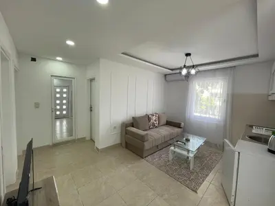 a living room with a couch and a table at Days Inn Long Beach in Ulcinj
