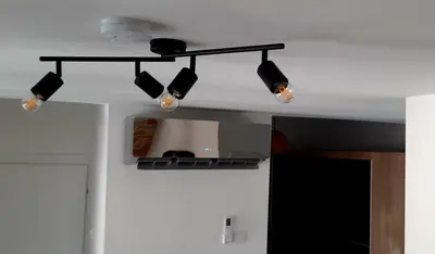 a track light on the ceiling of a room at Ric Apartment Budva in Budva