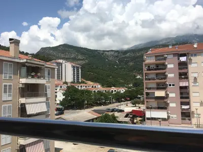 a view of a city from a balcony with buildings at Bolux Studio Apartment in Budva