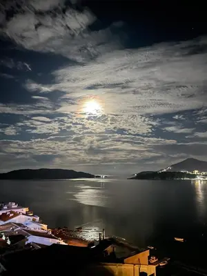 a view of a large body of water at night at Workation Panorama Escape in Budva