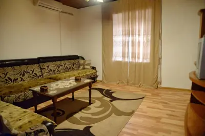 a living room with a couch and a table at house for rent 