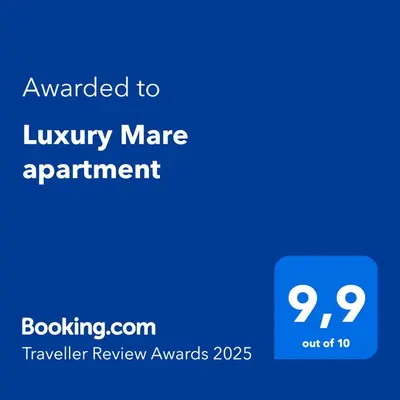 a blue sign with the text awarded to luxury mere apartment at Luxury Mare apartment in Bar