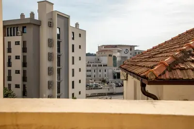 a view of the city from a balcony at Porta Volta Apartments in Becici