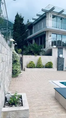 a large house with a patio in front of it at Villa Premium S in Bar