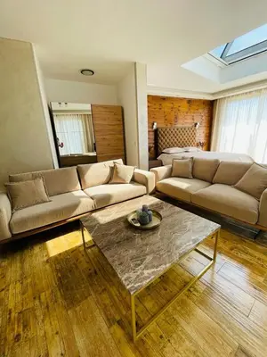 a living room with a couch and a coffee table at Villa Premium S in Bar
