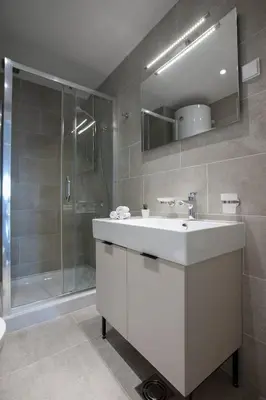 a bathroom with a sink and a shower at Apartment Andrea in Budva