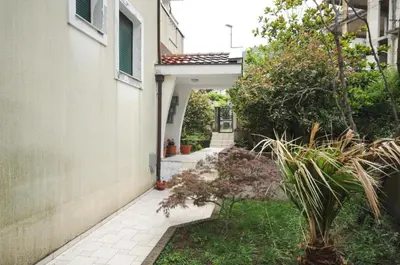 an entry way to a house with plants at Apartment Jana in Petrovac na Moru