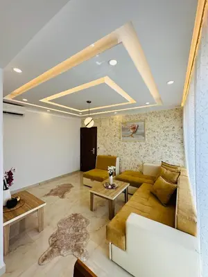 a living room with a couch and a table at Luxury Villa Ulcinj in Ulcinj