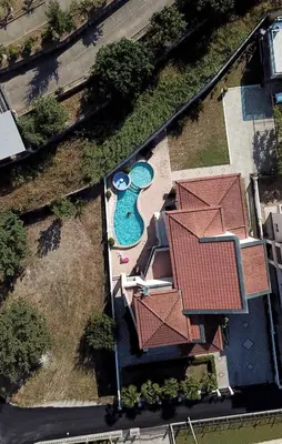an overhead view of a swimming pool with red roofs at Luxury Villa Ulcinj in Ulcinj