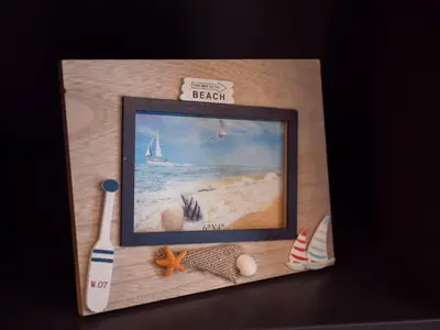 a picture of a beach in a picture frame at Luxury modern apartment 8min walk from beach in Becici in Rafailovici