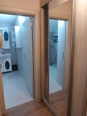 a bathroom with a shower and a glass door at MASA in Bar