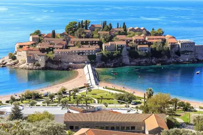 a town on an island in the water at BARBARA SVETI STEFAN in Sveti Stefan