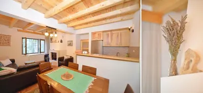 a living room and a kitchen in a house at Forest house in Cetinje