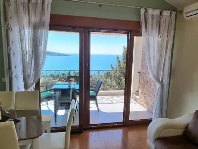 a living room with a view of the ocean at Villa Perla with Sea View in Bar