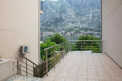 a balcony with a view of a mountain at Fortress View apartment II in Kotor