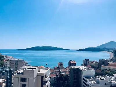 a view of a city and a body of water at AURA TOWER Apartments by Gaby in Rafailovici