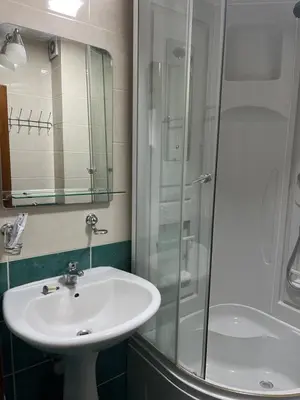 a bathroom with a sink and a shower at Mari in Ulcinj