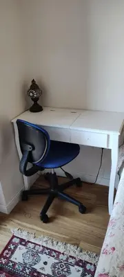a desk with a chair and a white computer desk at Todor apartment in Bar