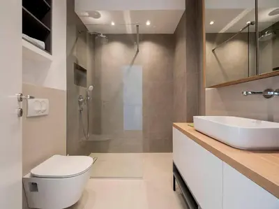 a bathroom with a toilet and a sink and a shower at Lovely Partial Sea View one bedroom Flat in Horizon Residences A24 in Becici