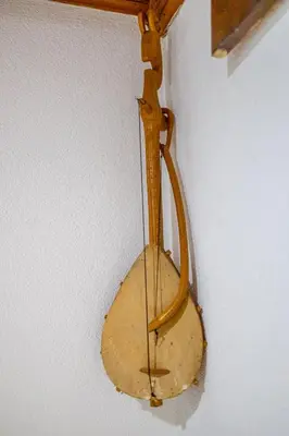 a wooden object hanging from a wall at Lake House Buric in Vranjina