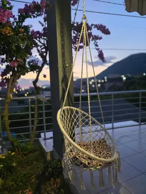 a hanging basket with a leopard on a balcony at Family apartment-DiLorena in Bar