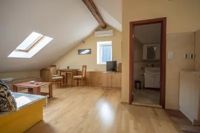 a living room with a couch and a table at Apartments Radimir in Kotor